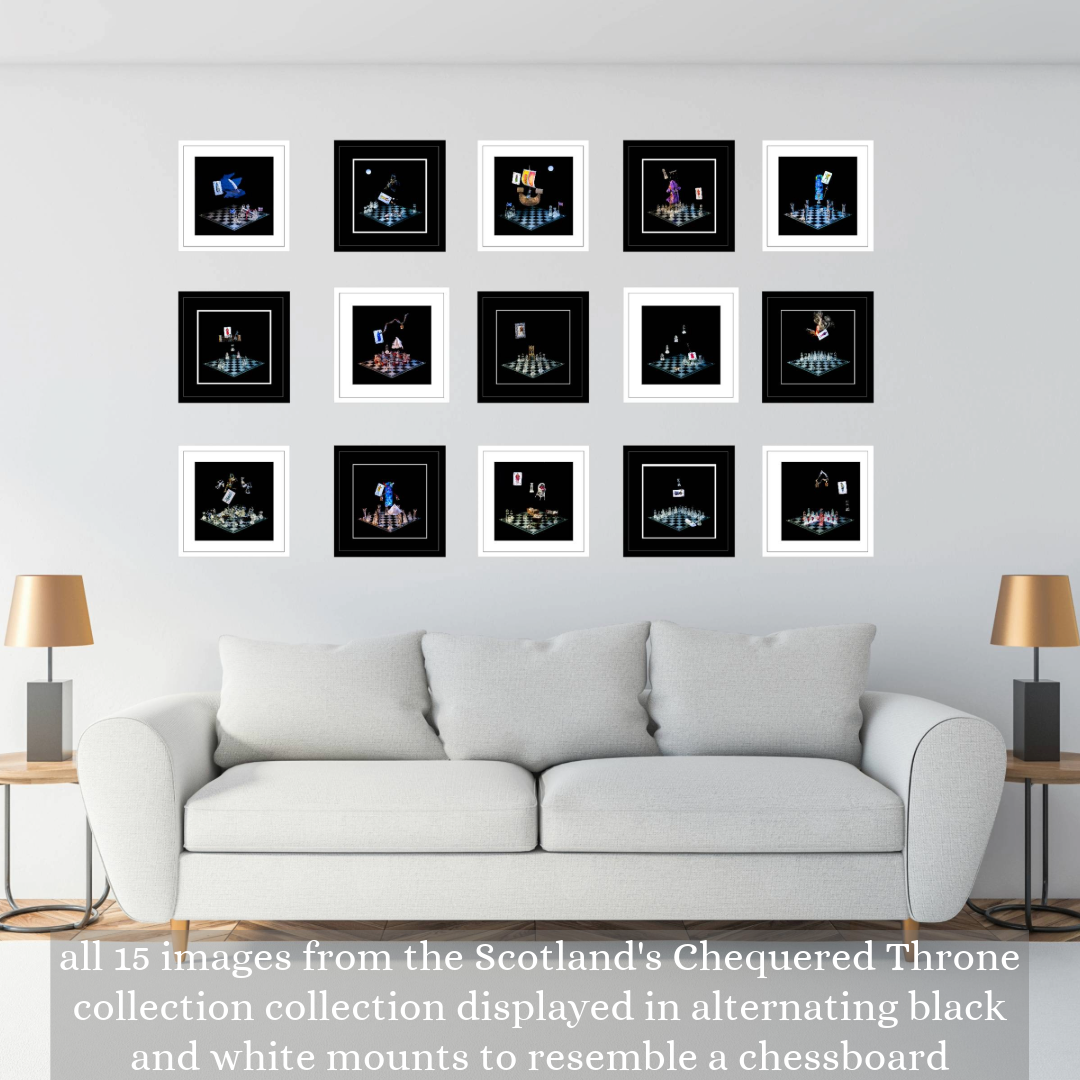 Set of 15 photographic art prints from the Scotlands Chequered Thrones collection displayed in a grid with alternating black and white frames to resemble a chessboard on a grey wall above a grey sofa